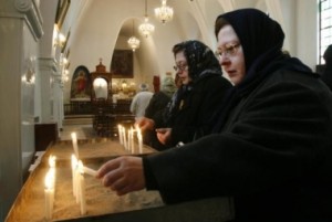 iranian-christian-women-light-candles-during-christmas-mass-at-a